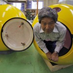 Noah escape pod is demonstrated by New Cosmo Power president Shoji Tanaka